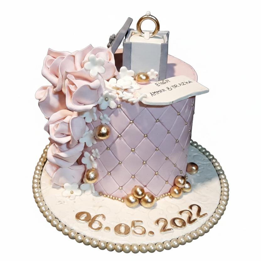 Engagement quilted ring box cake with pure white background
