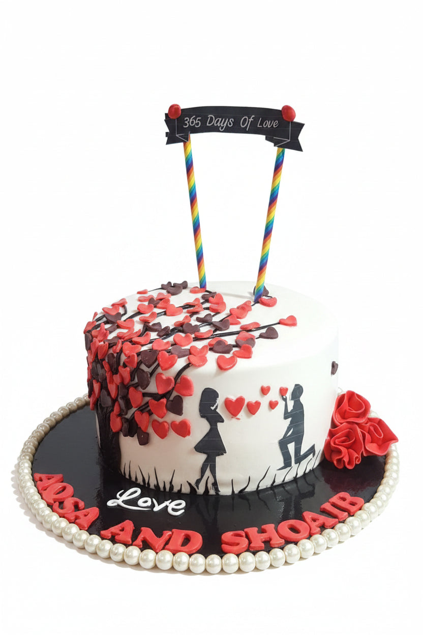365 Days of Love anniversary cake with black heart tree, couple proposal silhouette, red roses and custom name board by Marbella Cakes