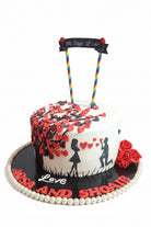 365 Days of Love anniversary cake with black heart tree, couple proposal silhouette, red roses and custom name board by Marbella Cakes