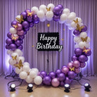 Purple white butterfly birthday ring arch decoration with chrome purple mauve balloons, gold 3D butterflies, Happy Birthday black sign and purple backdrop with LED spotlights