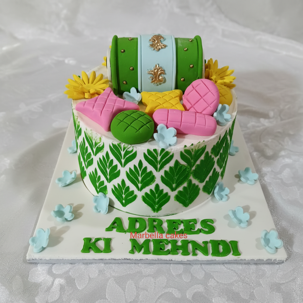 Mehndi stencil cake with dholki topper and fruits on white background
