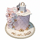 Engagement quilted ring box cake with pure white background