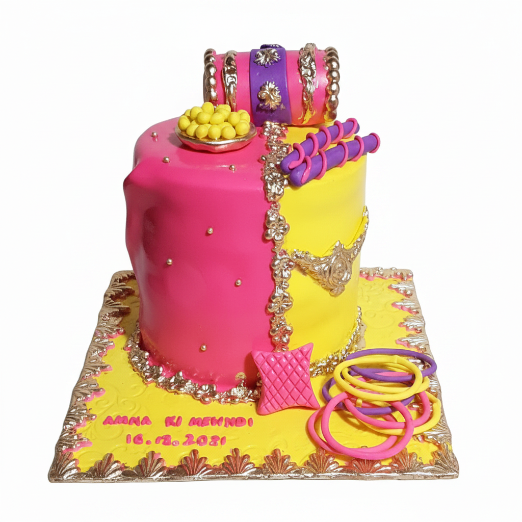 Hot pink yellow Mehndi cake with dholki topper and bangles on white background